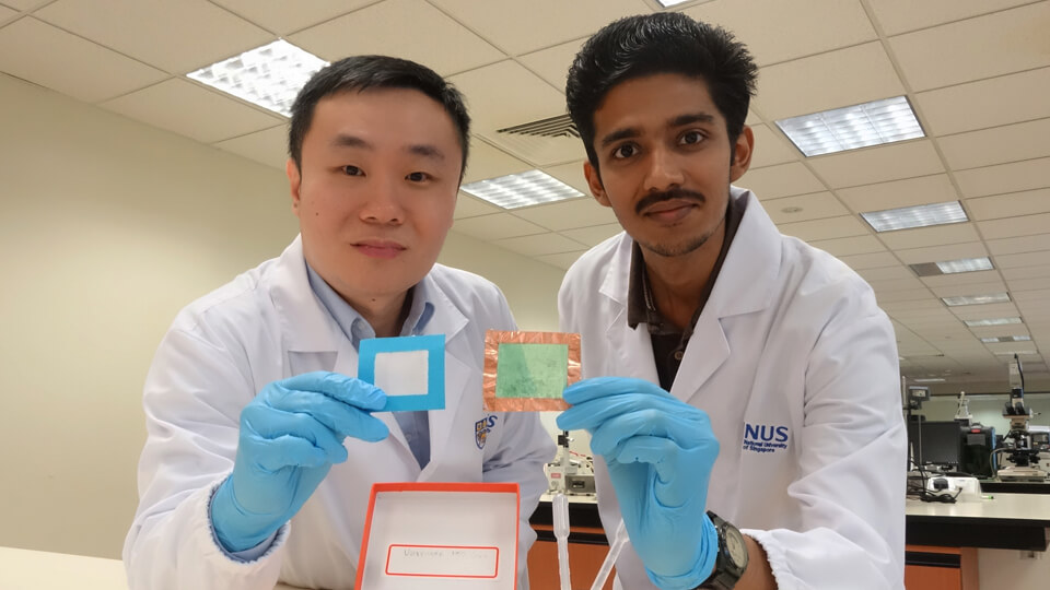Assistant professor Tan Swee Ching (left), Sai Kishore Ravi (right) and their team from the National University of Singapore's Faculty of Engineering developed a nanofibre solution that creates thin, see-through air filters (held by Mr Sai) that can remove up to 90 per cent of PM2.5 particles and achieve 2.5 times better air flow than conventional air filters.