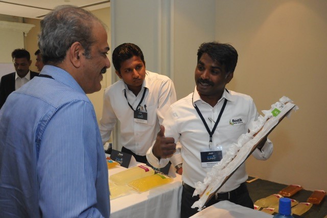 Rajeskaran Thangavel, right, and Denzil Sebastian explain Bostik’s products.